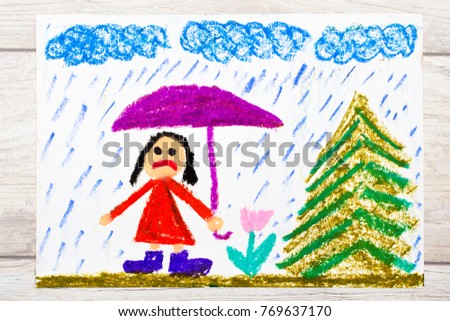 Photo of colorful drawing: Rainy weather and sad little girl holding umbrella. 
