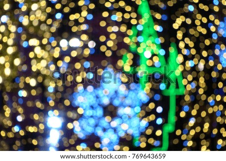 Abstract Blurred Christmas Lights gold Bokeh Background.