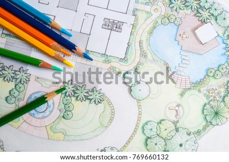 layout plan of home landscape design or garden design drawing by color pencil on white paper and group of color pencils  Royalty-Free Stock Photo #769660132