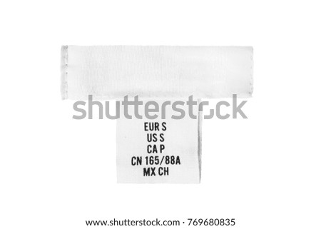 Small size white textile clothes label on white background