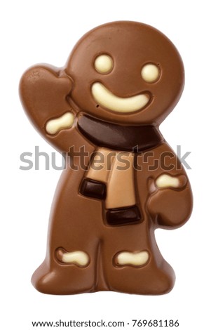 Christmas gingerbread man figure made from chocolate isolated on white