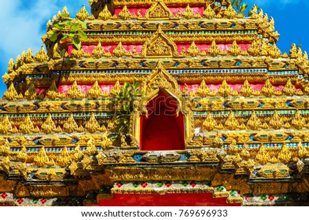 bas-relief Facade Close up of beautiful temple Wat Samai Kongka on Ko Pha Ngan, Thailand.