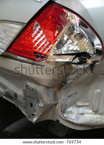 AUTOMOBILE ACCIDENT, SMASHED REAR PASSENGER SIDE Royalty-Free Stock Photo #769734