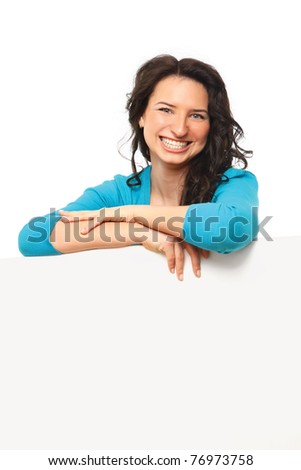 A beautiful smiling young woman with a blank