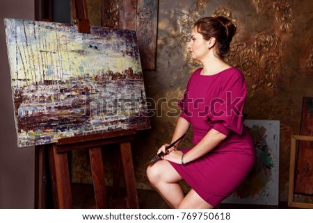woman painting at home