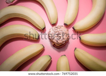 Healthy eating habits concept .Oat cookie and bananas on pink table.Top view.