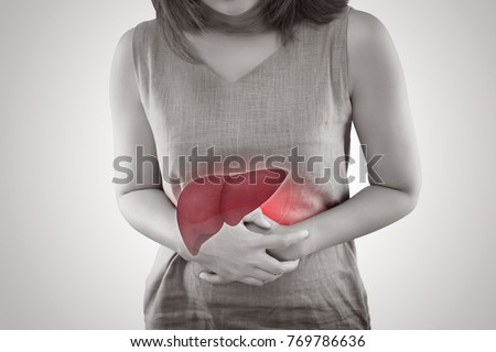 The Photo Of Liver On Woman's Body Against Gray Background, Hepatitis, Concept with Healthcare And Medicine Royalty-Free Stock Photo #769786636