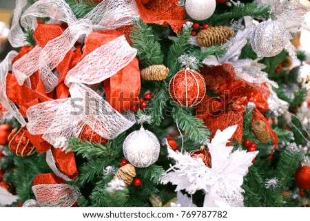 Decoration items on pine tree background - Christmas Season