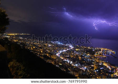 Thunderstorm approaching the city of Jounieh, Lebanon on the mediteranian coast. You can see beirut on the the left side of the picture on the horizon 