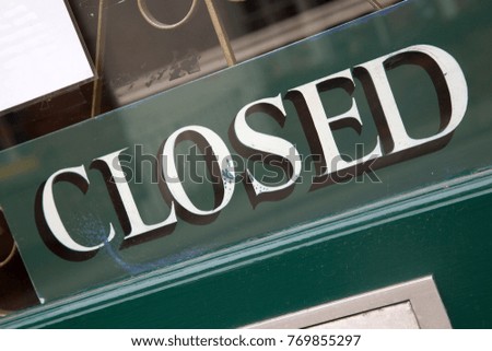 Closed Sign on Door Window
