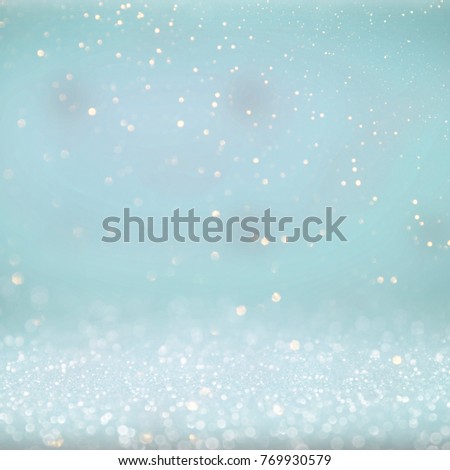 Holiday light background.  Christmas and New Year holidays glowing backdrop. Defocused Background With Blinking Stars. Blurred Bokeh.