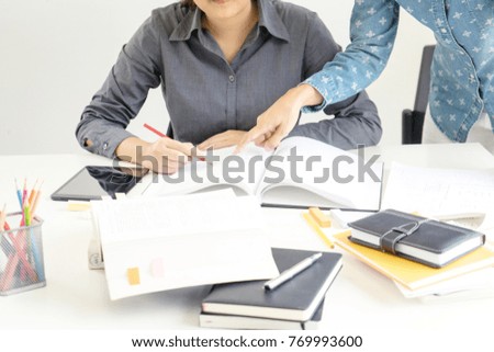 Two woman learn and teach tutor out of the class room concept education