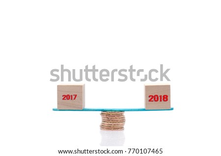 2018 New year concept. Close up of  wooden blocks on white background.