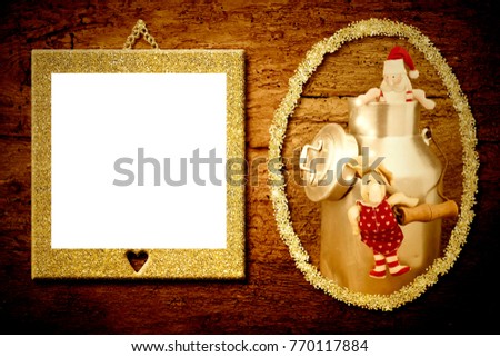 Photo frame Christmas greeting card. Funny Santa Claus and reindeer in a milk pot and frame to put photo or message on an old wooden background