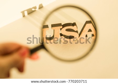 Magnifying glass on a white background with the word USA