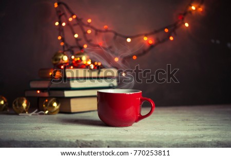 Christmas or new year decoration on modern wooden coffee table. Living room interior and holiday home decor concept. Toned picture