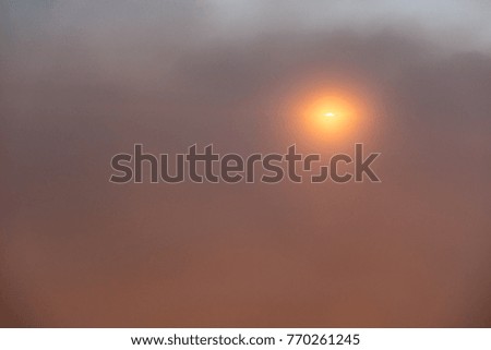 Orange sunset. Sun rising over cloudscape sky aerial view