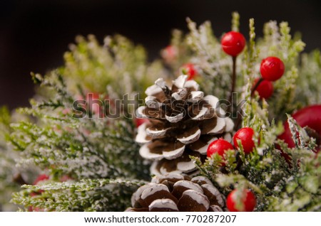 Christmas ornament closeup with apples and cones
