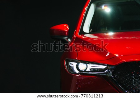 Headlight lamp of new cars,copy space. Royalty-Free Stock Photo #770311213