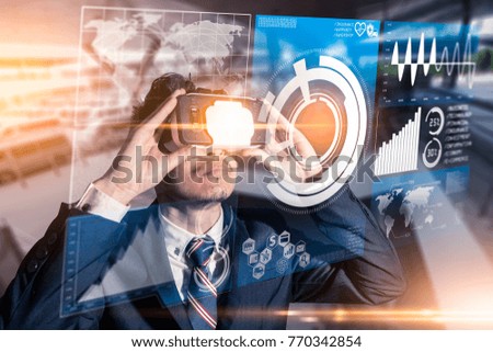 The abstract image of business man using a vr glasses overlay with virsual hologram image and blurred architecture is backdrop. the concept of communication, internet of things and future life.