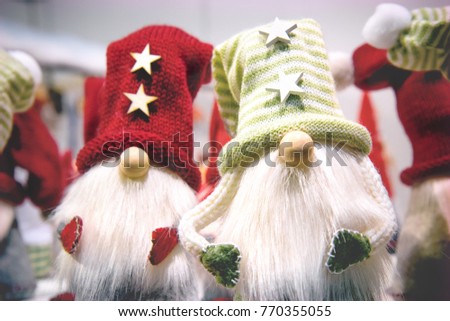 christmas story, two magical characters of xmas (maybe elves or gnomes)