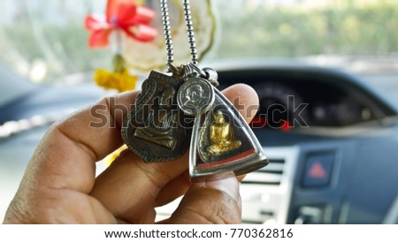 Thai Amulets in car Royalty-Free Stock Photo #770362816
