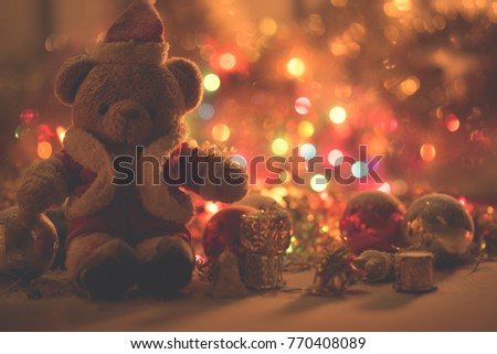 Christmas decoration with Bear wearing Santa Claus costume
