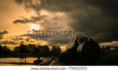 Soviet gas mask at nuclear dusk Royalty-Free Stock Photo #770423353