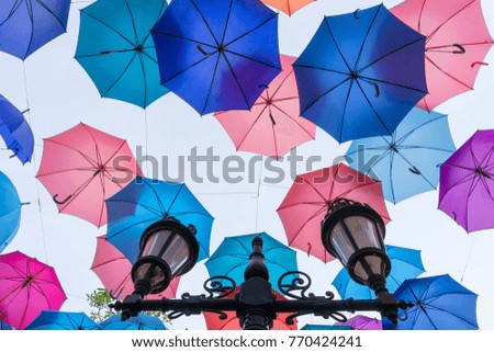 Pattern of colorful umbrella with lamp.