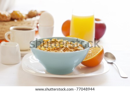 healthy breakfast with bowl of cereal Royalty-Free Stock Photo #77048944