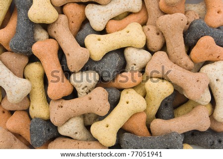 Background of bone shaped dog treats Royalty-Free Stock Photo #77051941