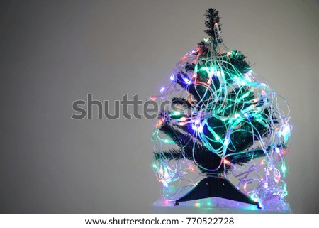 Christmas holiday blinking abstract background with decorated christmas tree. isolated on white or gray background. 
