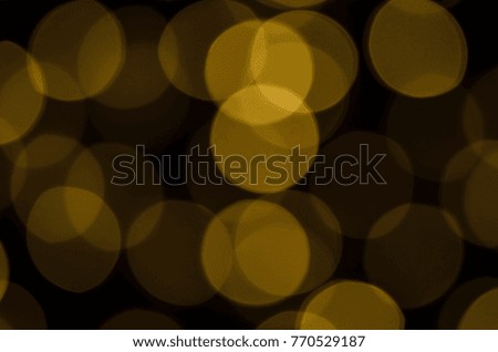 Soft colorful bokeh background. Luminous garlands of electric lights. Copy space to add text. Saturated colors. Blurry abstraction. Gentle tone. Dark night. Festive party in city. Defocus effect.