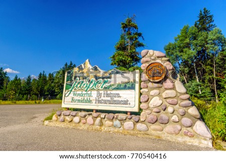 Welcome to wonderful and formidable Jasper, welcoming sign to the town, Alberta, Canada Royalty-Free Stock Photo #770540416