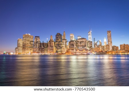 Lower Manhattan East River reflections at sunset - New York City.