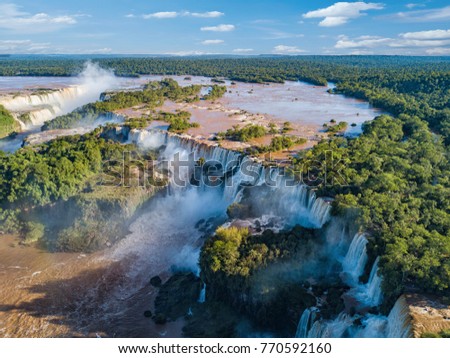 Aerial view of the Iguazu Falls. View over the Garganta del Diablo the Devil's Throat.  Royalty-Free Stock Photo #770592160