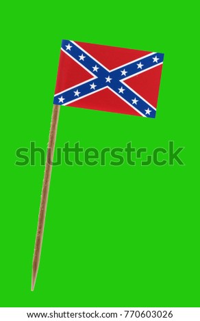Tooth pick wit a small paper Confederate rebel flag on a green screen for chromakey 