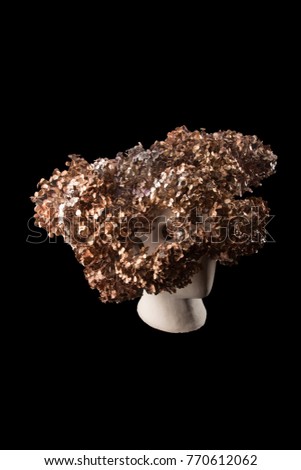 Vase statuette silhouette of human head with holes with flowers