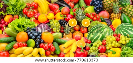 Assorted fresh ripe fruits and vegetables. Food concept background. Top view. Copy space. Royalty-Free Stock Photo #770613370