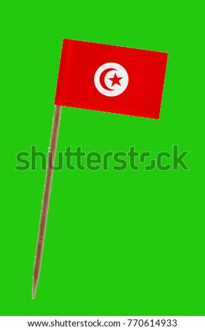 Tooth pick wit a small paper flag of Tunisia on a green screen for chromakey 