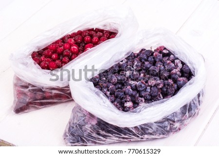 Natural vitamins.Frozen sweet garden berries. Studio Photo