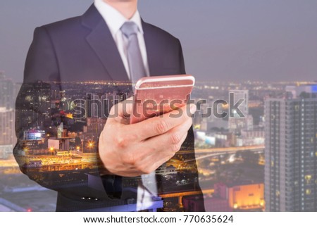 Double exposure of businessman use smartphone, communication 4G 5G node networking telephone cellsite and cityscape urban in the night as business, technology and telecom concept