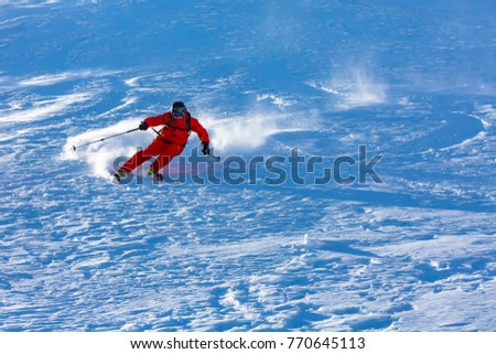Skiing in the snowy mountains, Carpathians, Ukraine, good winter day, ski season.