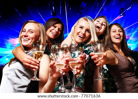 A group of young people in club Royalty-Free Stock Photo #77071636