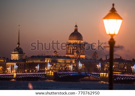 View from the river is not on the main attraction of St. Petersburg St. Isaac's Cathedral. Night illumination of the city on the occasion of the celebration of Christmas and New Year
