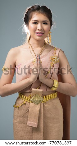 Southeast Asian woman posing in Thai period costume, Thai period dress or
Traditional Thai Costumes.
