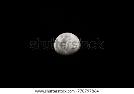 Quarter Moon in black background
