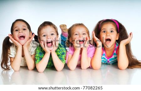 laughing small kids on a white background