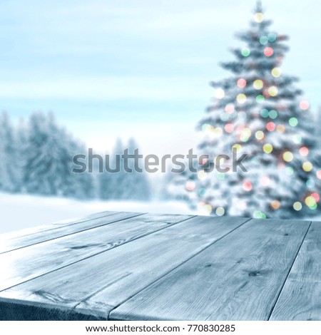 table background and christmas tree with snow and frost decoration 