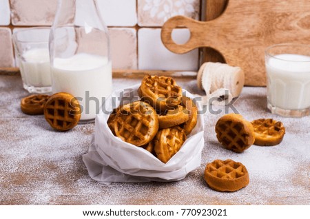 Traditional round Belgian waffles on the table. Selective focus.